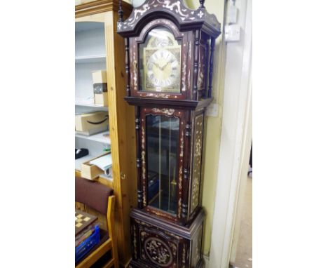 A reproduction Chinese hardwood and mother of pearl longcase clock, 215cm high, with weights and pendulum.&nbsp; 