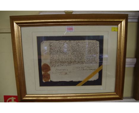 MANUSCRIPT DOCUMENT:&nbsp;an antique French paper document, probably 18th century, 18 x 24cm, framed and glazed.&nbsp; 