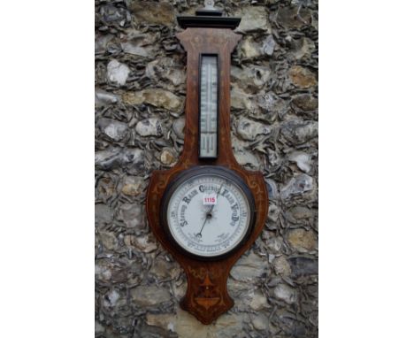 A late 19th century rosewood and inlaid aneroid banjo barometer.&nbsp; 