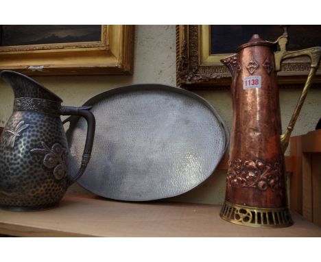 A Secessionist WMF copper and brass flagon,&nbsp;37cm high, (lacking finial to hinged cover); together with a hammered pewter