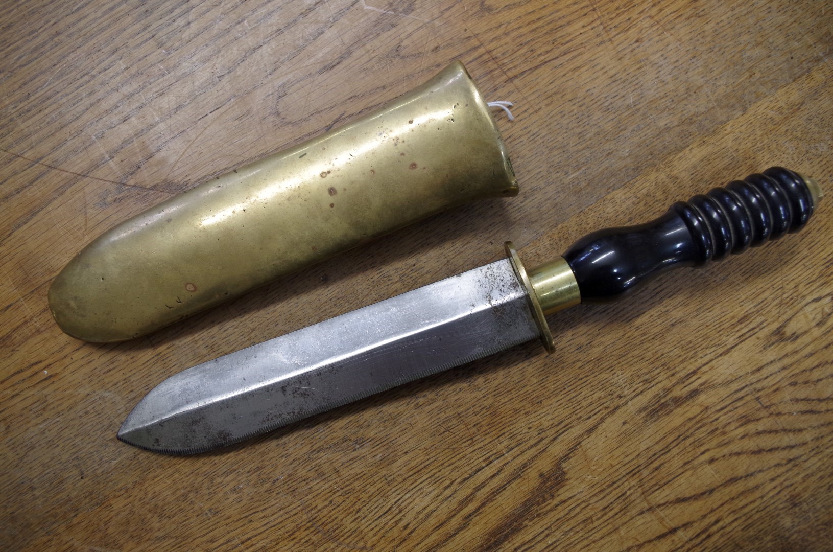 A Siebe Gorman diver's knife and bronze sheath, with 'Ebonite' handle ...