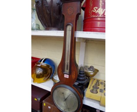 A 19th century mahogany and inlaid banjo barometer, the silvered dial inscribed 'J Cortis, 27 Leather Lane, Holbn, London'.&n