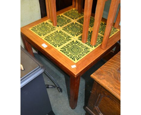 A funky tile top mid-century occasional table