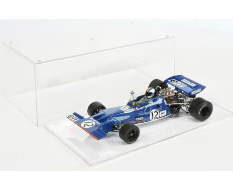 Exoto 1/18 scale model F Cevert Ford  with racing number 12 - Good (1 wheel detached ) unboxed in a perspex display box.COLLE