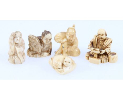 Group of five small Japanese netsuke depicting Ebisu and other figures. (5)