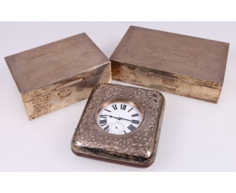 Chester silver travel clock, hallmarks rubbed 11.5cm and two engine turned silver cigarette boxes 16.5cm and 13cm.