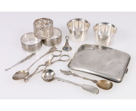 Silver engine turned cigarette case, sugar tongs, fob seal, teaspoons and napkin rings, 192g of weighable silver   CONDITION 