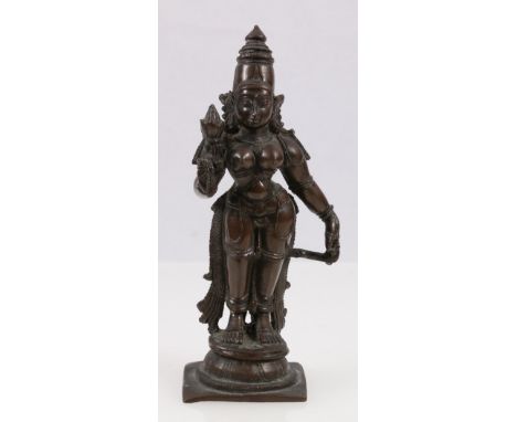 19th century bronze model of Parvati holding a lotus flower on a stepped base, 14cm.