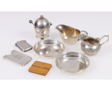 Group of small silver, including two miniature cream jugs, pair of pin trays, an aide memoire case, vesta case, egg-shaped mu