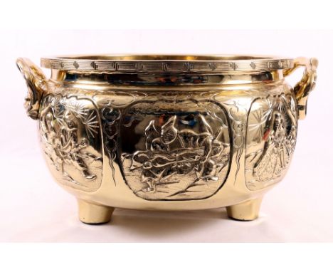 Large early 20th century Japanese bronze jardiniere with dragon loop handles, the body decorated with six panels of Samurai a