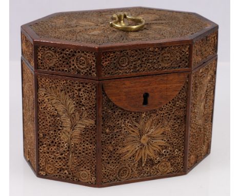 George III octagonal gilt paper scroll tea caddy, with hinged brass handle to lid, 13.5cm.