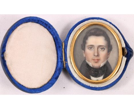 BRITISH SCHOOL (19TH CENTURY) Portrait of a gentleman Watercolour, oval miniature on ivory, unsigned in blue velvet box 4.5cm