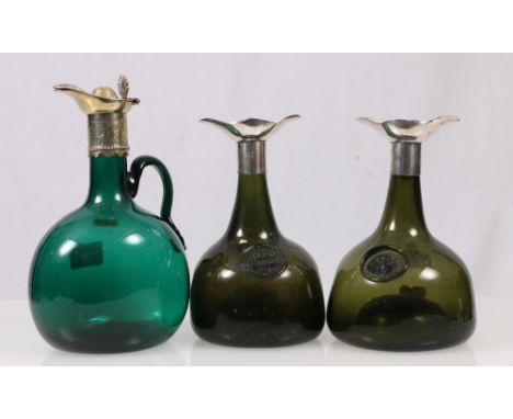 Sealed green glass onion shaped bottle, the seal for E Herbert 1721, another similar with coat-of-arms seal, both with later 