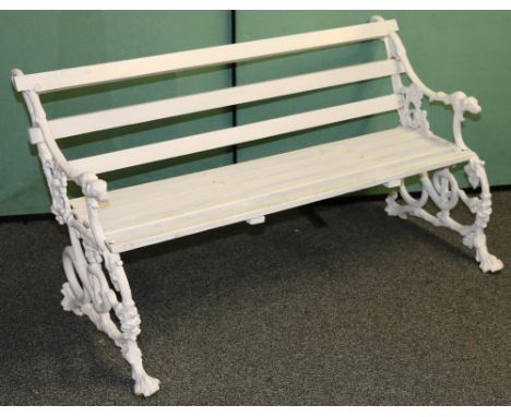 A Victorian painted cast iron garden bench, with naturalistic serpent and vine frames, later timber slats, (a/f), 74cm x 143c