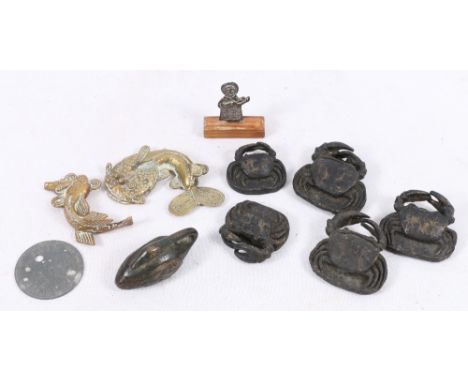 Set of five graduated bronze crab opium weights, a goose weight, two African gilded brass fish weights etc