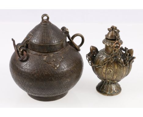 Tibetan bronze bottle of flattened spherical form with cup and suspension chain, 9cm and an Indian spherical box and cover, 1