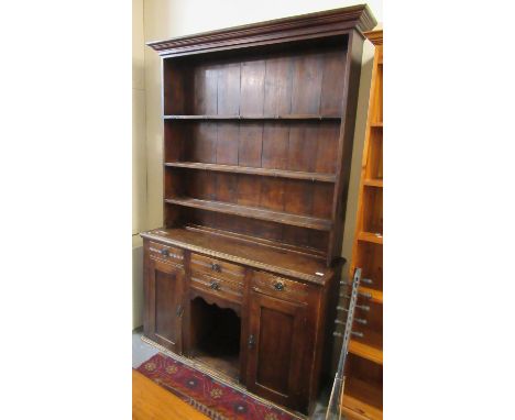 Late 19th/early 20th Century Welsh stained pine pot board dresser with three shelf rack. 132cm wide approx. (B.P. 21% + VAT)T