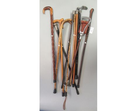 Collection of walking sticks, some with silver collars, shooting stick, etc. (11) (B.P. 21% + VAT)