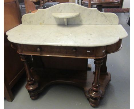 Victorian mahogany and walnut Duchess style bow fronted washstand with veined marble top and raised back with over shelf. 124