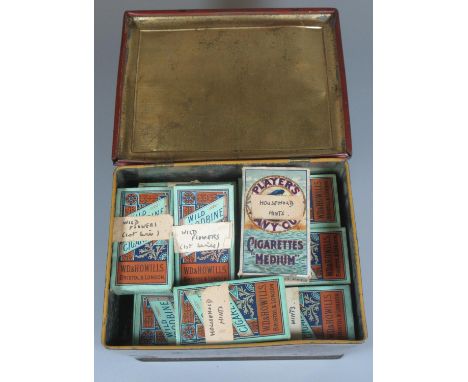 Vintage tin box of assorted Players and Wills cigarette cards, Wild Flowers, Household hints, etc.(B.P. 21% + VAT) 