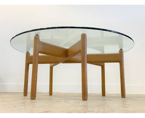 Niels Bach, an unusual Danish turned and joined oak coffee table with circular plate glass top, circa 1960's. H44cm, D105cm