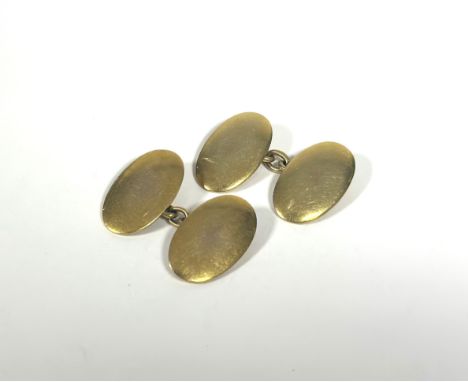 A pair of 15ct yellow gold chainlink cufflinks, each oval plaque unengraved, stamped marks. Plaques 20mm by 12mm, total weigh