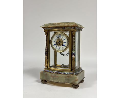 A French onyx and champleve enamel mantel clock, late 19th century, the bowed oblong case with bevelled glass on shaped toupi