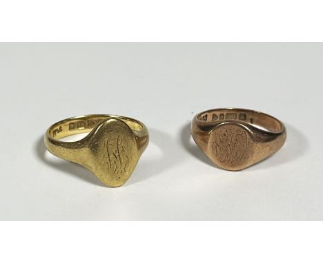 An 18ct gold signet ring, the oval plaque engraved with a monogram; together with a 9ct gold signet ring, the oval plaque eng