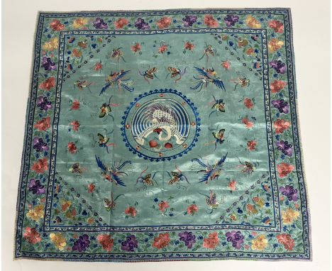 A Chinese embroidered silk square, early 20th century, worked to both sides in coloured threads with pheasants, butterflies a