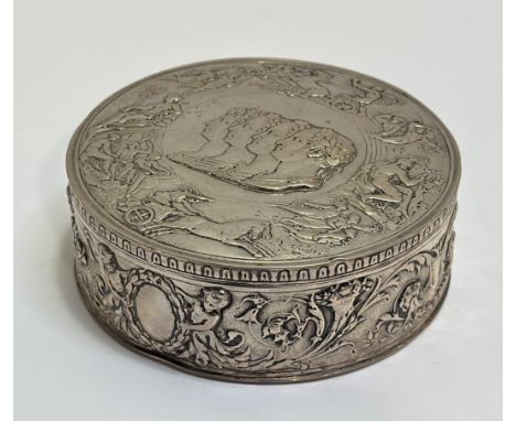 A good German silver box, late 19th century, probably Hanau, of circular form, the hinged cover chased with portrait busts of