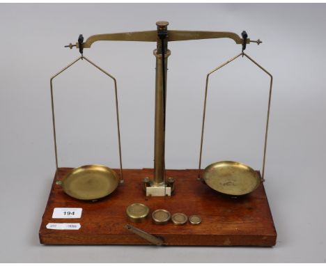 Set of balance scales with brass weights 
