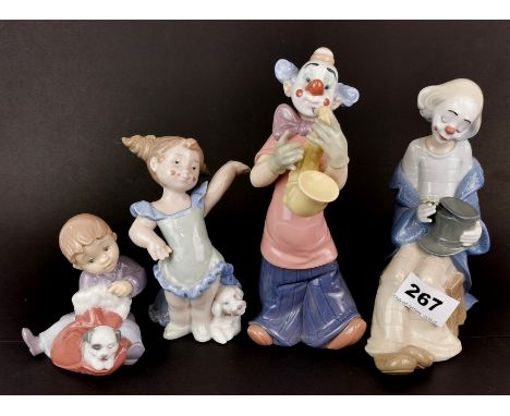 A group of four Nao figures, tallest 19cm. No visible damage or repair.
