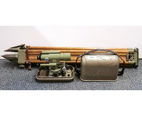 A vintage surveyors level and tripod.