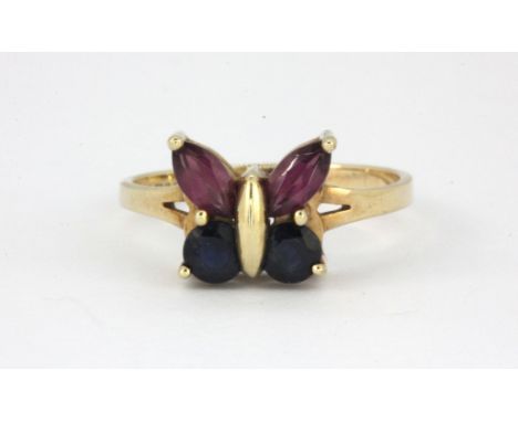 A 9ct yellow gold sapphire and pink tourmaline set butterfly shaped ring, (N.5).