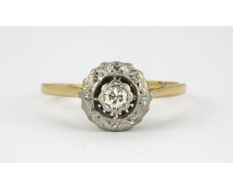 An early 20th century 18ct yellow gold and platinum diamond set ring, (P.5).