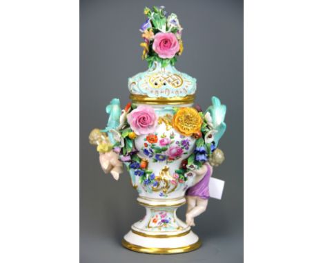 A fine 19th Century Meissen porcelain pot pourri jar and cover decorated with cherubs and flowers, H. 26cm. Condition: some d