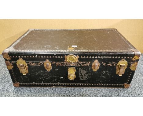 An Oshkosh vintage cabin trunk, 92 x 54 x 33cm, no key.