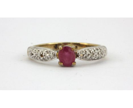 A 9ct yellow gold ring set with a ruby and diamond shoulders, (two small diamonds missing), (L).