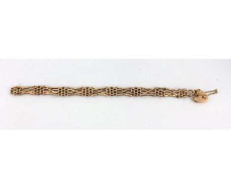 A 9ct yellow gold gate bracelet, L. 17cm.&nbsp;Weight. 7.3g.