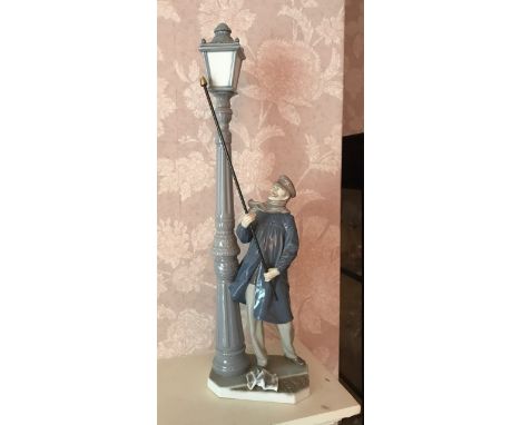 A large Lladro figure of the lamp lighter, H. 47cm.