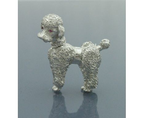 A mid 20th Century 14 carat white gold brooch in the form of a poodle with ruby set eyes and diamond set collar, 17.9 g CONDI