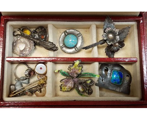 A collection of various costume jewellery to include a sterling silver and turquoise enamel pendant, a pewter and faux turquo