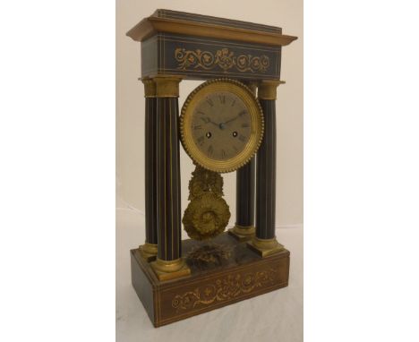 A 19th Century French mahogany and marquetry inlaid cased mantel clock of architectural form, the eight day movement with bra