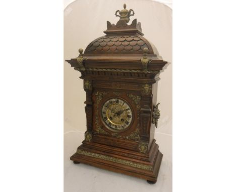 A 19th Century Continental walnut cased bracket clock, the eight day movement by Gustav Becker of Freiburg with silvered dial