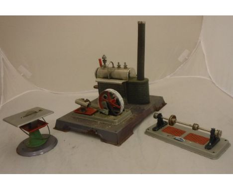 A German tinplate stationary steam engine stamped to base "Made in Germany" together with two accessories one bearing "Wilesc