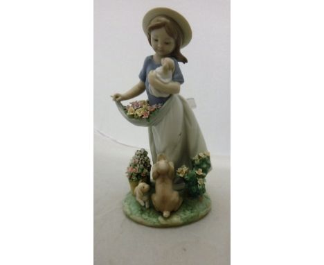 A Lladro figure "A Romp in the Garden" (6907) CONDITION REPORTS Some light surface scratches and accretions.  Some areas of l