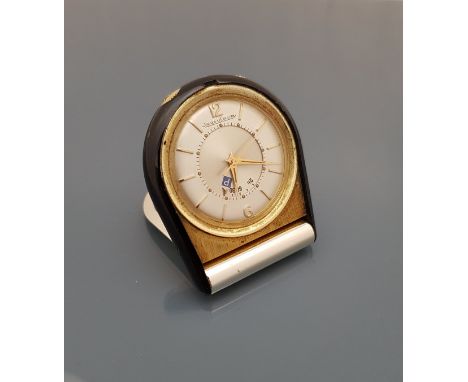 A mid 20th Century Jaeger Lecoultre travel clock, the enamel dial set with Arabic numerals and markers and No'd. "789050" to 