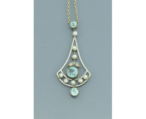 An Edwardian gold, pearl and aquamarine set necklace of drop form CONDITION REPORTS Light surface scratches to the metal, acc
