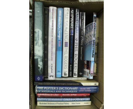 A box of books relating to studio pottery to include "The Potter's Art" by GARTH CLARK, "The Ceramic Spectrum" by ROBIN HOPPE