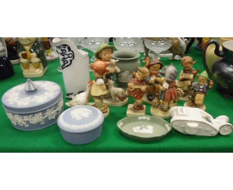 A collection of seven Goebel Hummel figures, four various items of Wedgwood Jasper ware, a Royal Worcester blue and white rel